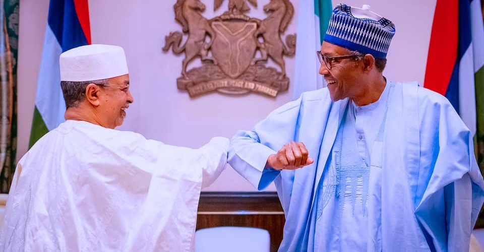 PRESIDENT BUHARI FELICITATES WITH LABOUR AND EMPLOYMENT MINISTER, CHRIS NGIGE AT 69